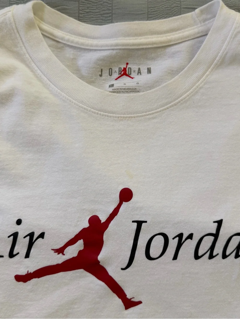 Jordan White Short Sleeve Tee with Red Jumpman Logo